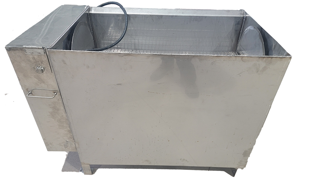 Profile view of a poultry man rotary scalder