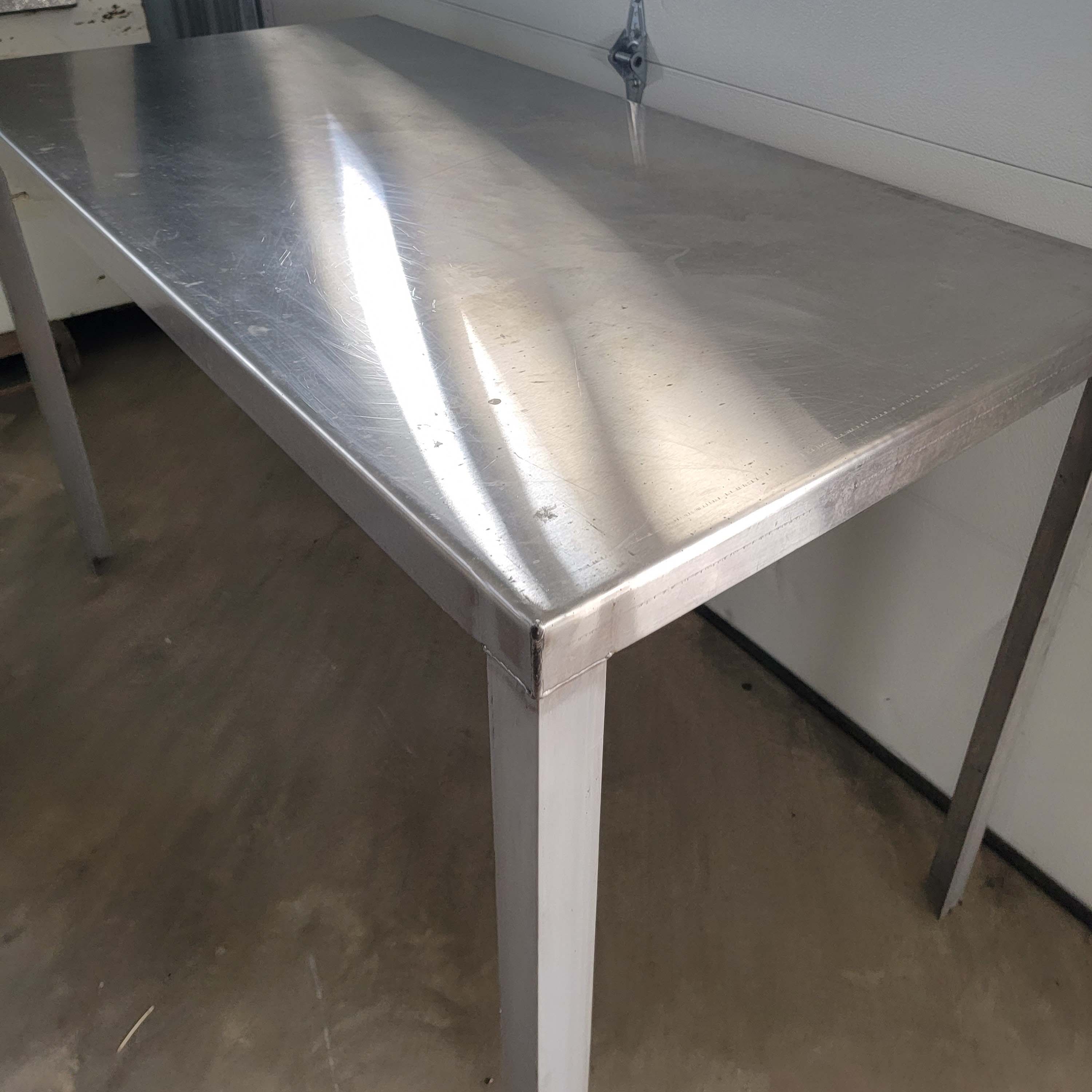 stainless steel table for food prep. 5' long.